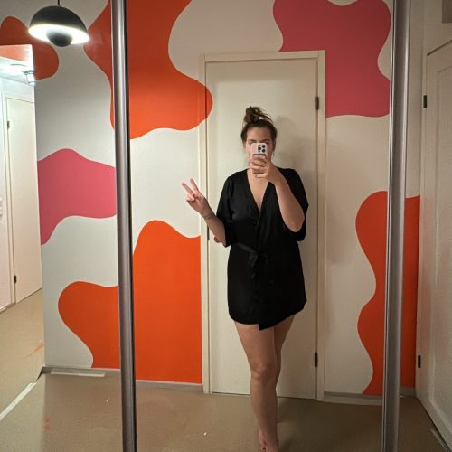 Mirror selfie of my diy paint project of pink and orange blobs